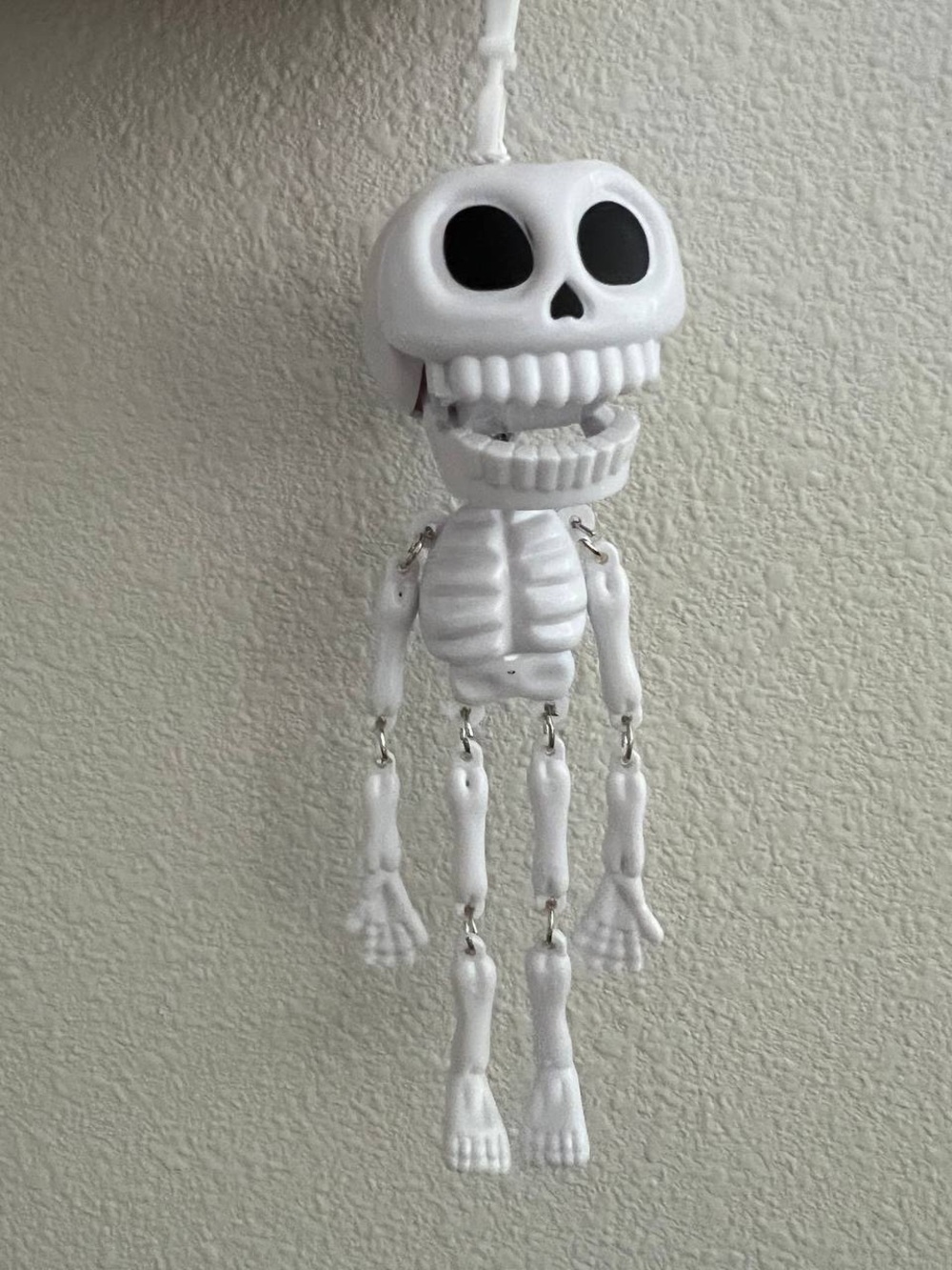 White Hanging Skeleton Decor - Festive Skull Accent